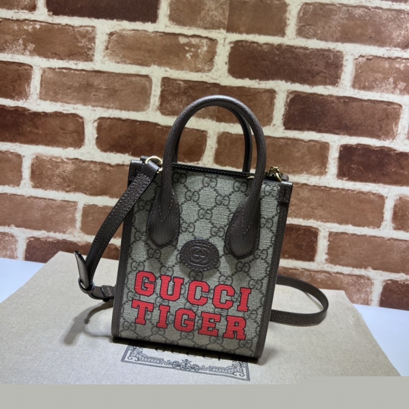 G*u*i top handle bags